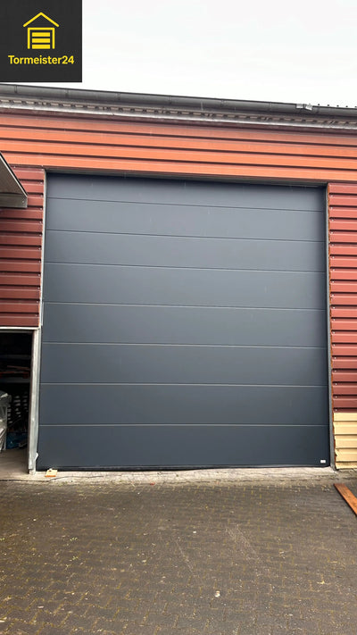 garagedeur Design-Line Antra RAL 7016 antracietgrijs | Premium-sectionaaldeur inkl. aandrijving TS100, 2 handzender & Wandschalter Tormeister24 garagedeur