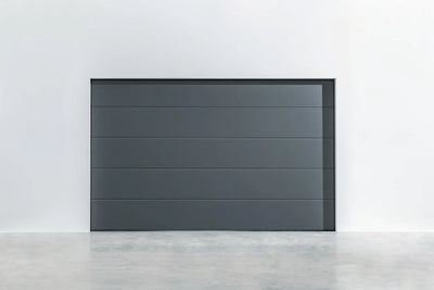 garagedeur Design-Line Granite in RAL 7043 – strukturierte oppervlak in edlem Dunkelgrau.