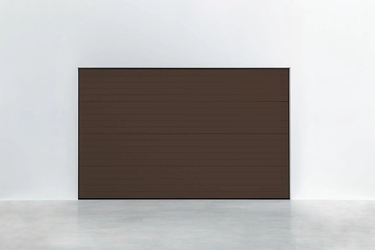 Garagentor Stucco Colore RAL 8014 Sepiabraun – Frontansicht mit dekorativer Oberfläche und moderner Linienführung