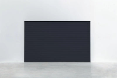 garagedeur Stucco Colore Tiefschwarz – moderne garagedeur met dekorativer Stucco-oppervlak, ideal voor jedes Zuhause, hohe Isolierung en Sicherheit.